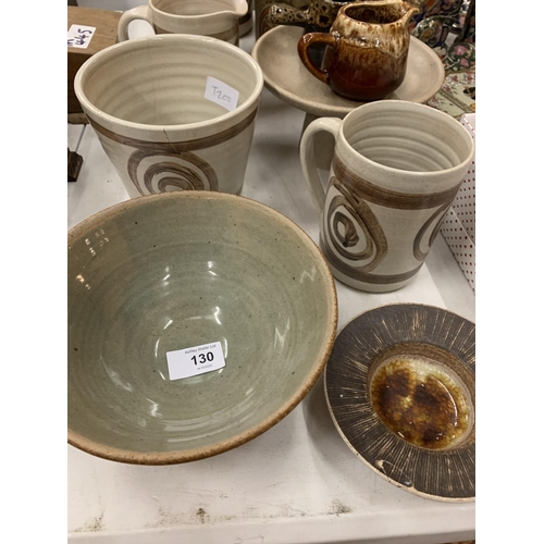 130 - AN ASSORTMENT OF STUDIO STYLE ITEMS TO INCLUDE JUGS AND BOWLS