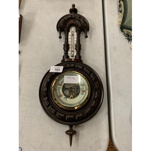 163 - A VINTAGE WOODEN BAROMETER WITH INCORPORATED THERMOMETER GLASS A/F