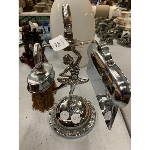 168 - A SILVER COLOURED CRUMB TRAY AND BRUSH ON A BALLERINA STAND