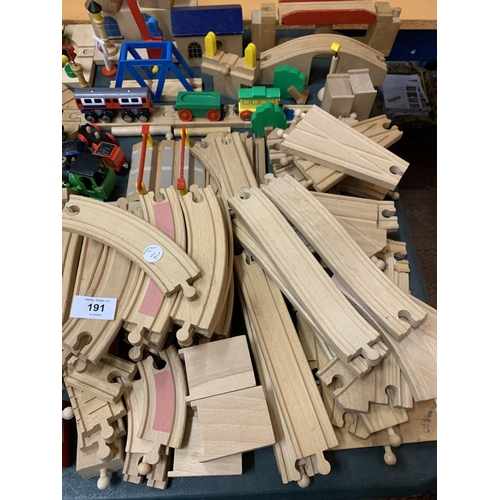 191 - A LARGE QUANTITY OF WOODEN TOY TRAIN TRACKS AND THOMAS THE TANK ENGINES TO INCLUDE A LARGE LIDDED BA... 