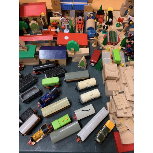 191 - A LARGE QUANTITY OF WOODEN TOY TRAIN TRACKS AND THOMAS THE TANK ENGINES TO INCLUDE A LARGE LIDDED BA... 