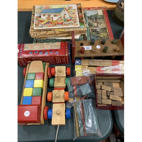 203 - A SELECTION OF VINTAGE WOODEN TOYS AND JIG SAWS