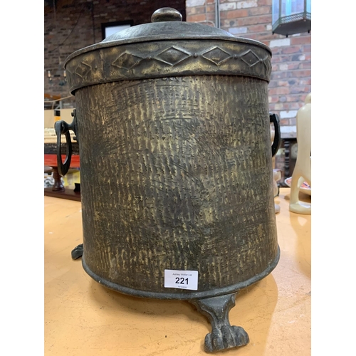 221 - A BRASS LIDDED COAL BUCKET WITH HORSESHOE HANDLES