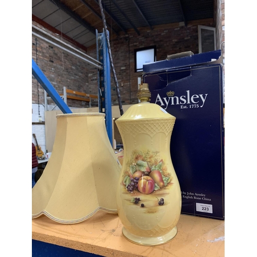 223 - AN AYNSLEY FRUIT DECORTED TABLE LAMP AND SHADE