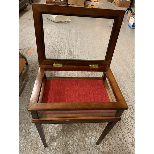 229 - A MAHOGANY FOUR LEGGED DISPLAY CABINET