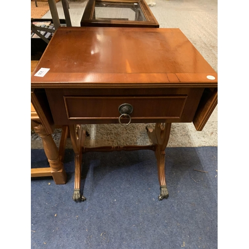 230 - A PINE SIDE TABLE WITH DECORATIVE UNICORN DETAIL AND A WOODEN DROPPED LEAF TABLE WITH CLAW FEET CAST... 