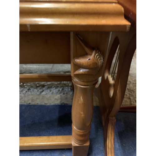 230 - A PINE SIDE TABLE WITH DECORATIVE UNICORN DETAIL AND A WOODEN DROPPED LEAF TABLE WITH CLAW FEET CAST... 