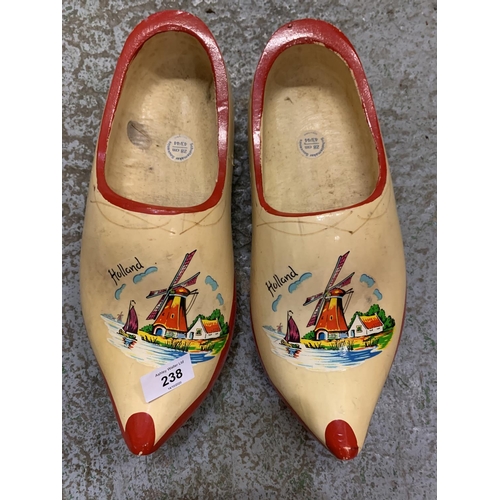 238 - A PAIR OF LARGE WOODEN SOUVENIR CLOGS FROM HOLLAND