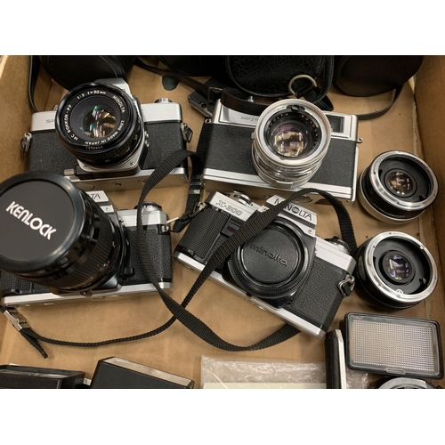 76 - A SELECTION OF CAMERA EQUIPMENT TO INCLUDE FOUR MINOLTA CAMERAS, LENSES ETC