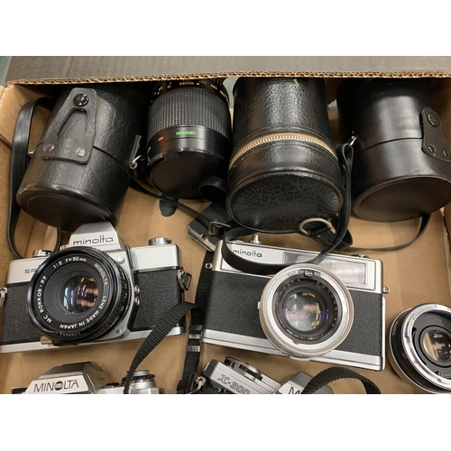 76 - A SELECTION OF CAMERA EQUIPMENT TO INCLUDE FOUR MINOLTA CAMERAS, LENSES ETC