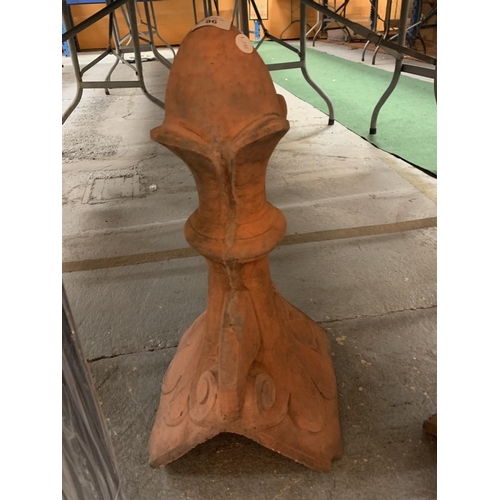 86 - A DECORATIVE TERRACOTTA ROOF FINIAL IN A CHESS PIECE STYLE