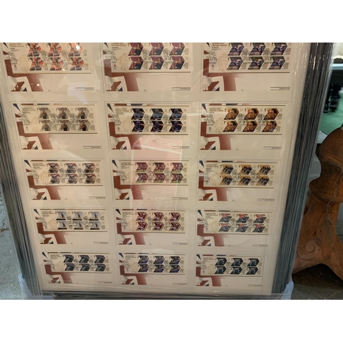 87 - A LARGE FRAMED COLLECTION OF ROYAL MAIL FIRST DAY COVERS OF GOLD MEDAL WINNERS AT THE  LONDON OLYMPI... 