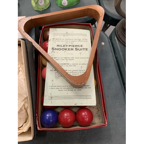 99 - TWO ORIENTAL CALIGRAPHY SETS AND A BOX OF SMALL SNOOKER BALLS