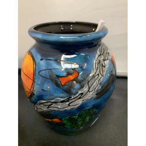 733 - AN ANIOTA HARRIS HAND PAINTED AND SIGNED HALLOWEEN VASE