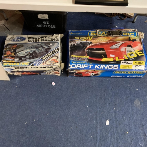 269 - TWO BOXES OF SCALEXTRIC TO INCLUDE FORD ESCORT XR3I AND DRIFT KINGS