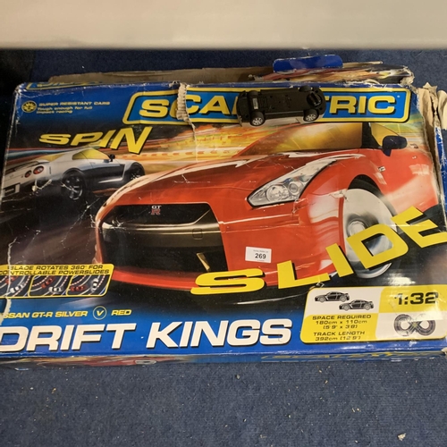 269 - TWO BOXES OF SCALEXTRIC TO INCLUDE FORD ESCORT XR3I AND DRIFT KINGS