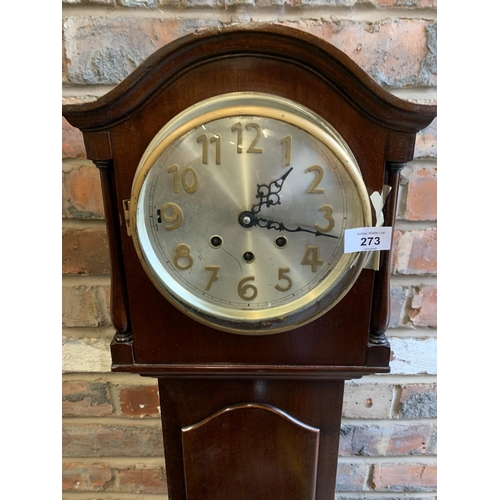 273 - A MAHOGANY GRANDDAUGHTER CLOCK (GLASS A/F)