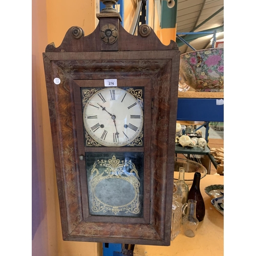 276 - AN ORNATE VINTAGE WOODEN WALL CLOCK WITH GOLD DETAIL