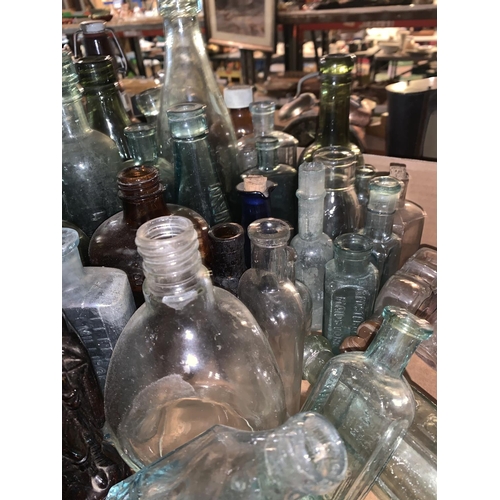 279 - A LARGE COLLECTION OF VINTAGE BOTTLES