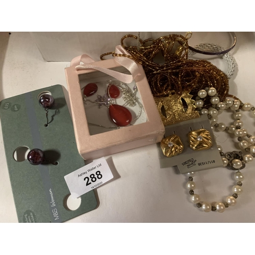 288 - A LARGE QUANTITY OF COSTUME JEWELLERY