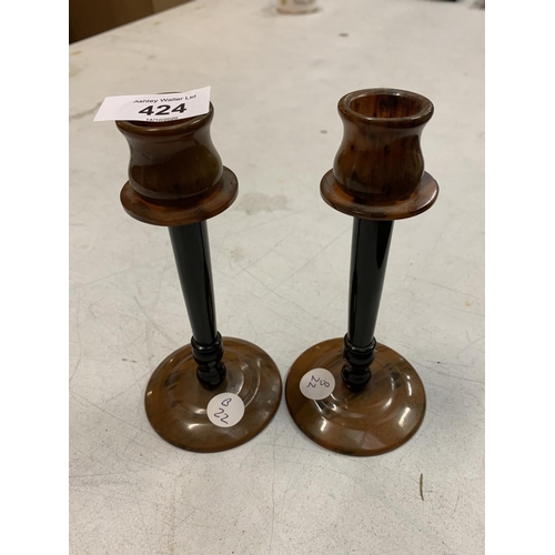 424 - A PAIR OF TORTOISE SHELL EFFECT CANDLE STICKS