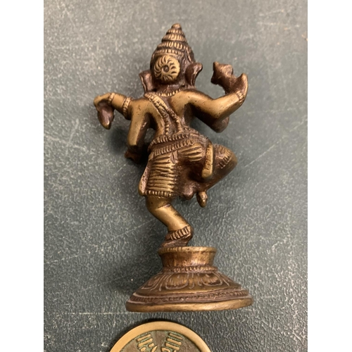 428 - A SINO-TIBETAN BI-METAL BRASS MODEL OF GANESH AND CHINESE BRASS AMULET COIN