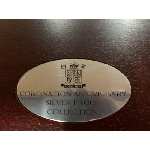 432 - A SET OF TWELVE COIN 50P 50TH ANNIVERSARY OF THE CORONATION SILVER PROOF SET WITH WOODEN PRESENTATIO... 