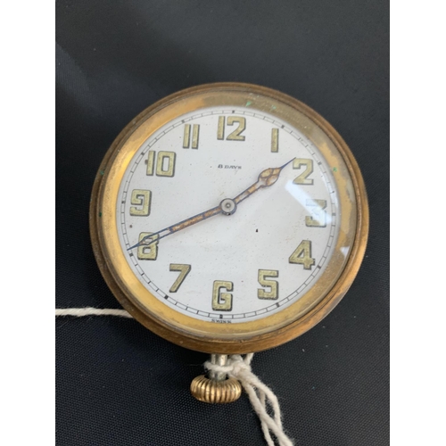 577 - A BRASS SWISS EIGHT DAY DASHBOARD CLOCK/WATCH (A/F)