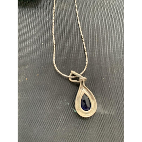 590 - SILVER MARKED BLUE PASTE AND MARCASITE TEARDROP PENDANT AND CHAIN. APPROX TOTAL WEIGHT 5 GRAMS