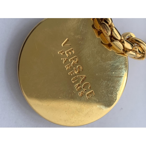 593 - A GOLD PLATED VERSACE MEDALLION WITH CHAIN