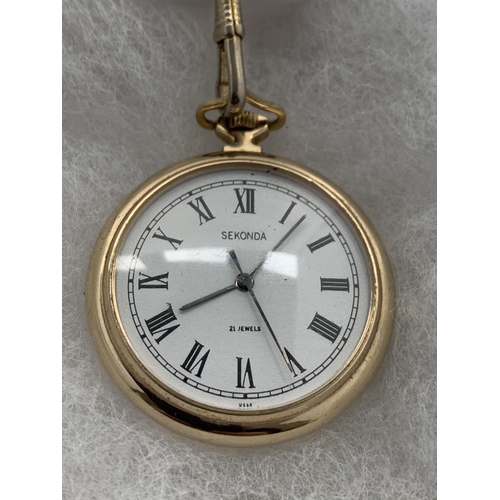 604 - A GOLD PLATED POCKET WATCH AND CHAIN