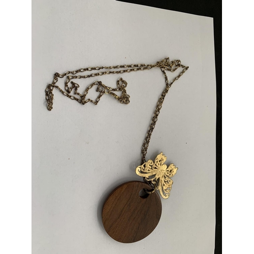 613 - A WOODEN BUTTERFLY NECKLACE