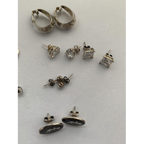 616 - TWELVE PAIRS OF SILVER EARRINGS