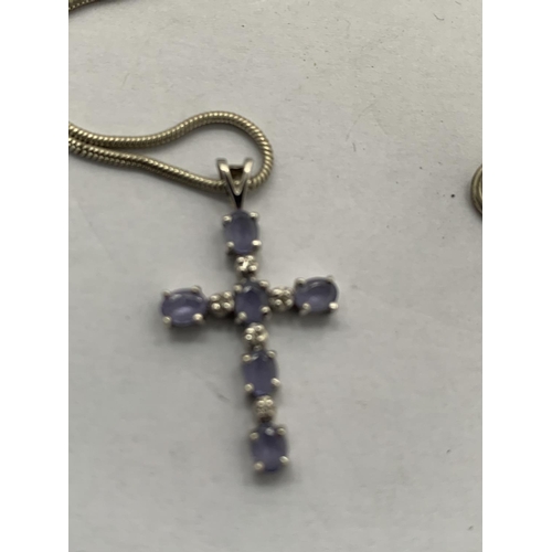 626 - A 9CT WHITE GOLD TANZANITE AND DIAMOND CROSS PENDANT WITH A WHITE METAL CHAIN (UNMARKED), APPROX TOT... 