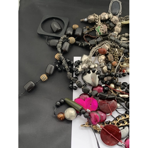 627 - A LARGE QUANTITY OF COSTUME JEWELLERY