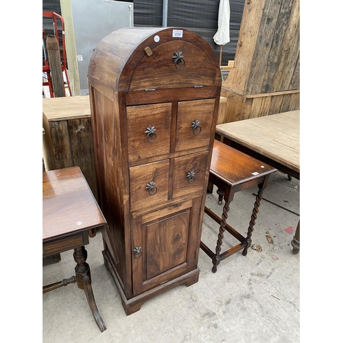 2136 - A MODERN INDONESIAN WOOD DOME TOPPED CHEST WITH TWO DOORS AND FOUR DRAWERS