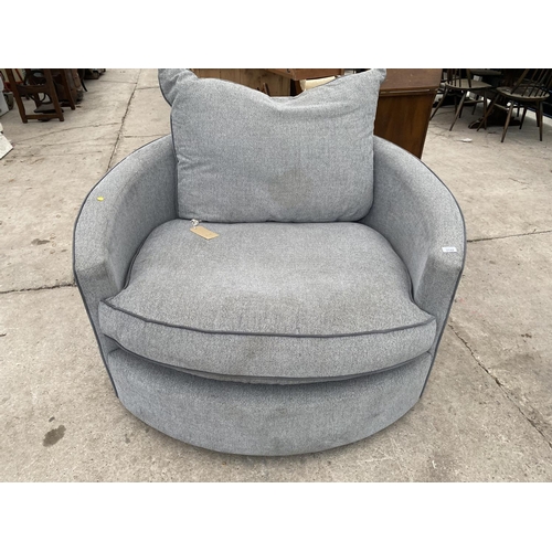 2142 - A MODERN CIRCULAR ARMCHAIR ON SWIVEL SUPPORT