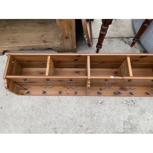 2143 - AN IKEA PINE COAT RACK WITH PIGEON HOLES, AN OVAL INLAID MAHOGANY BEVEL EDGE MIRROR AND A VICTORIAN ... 