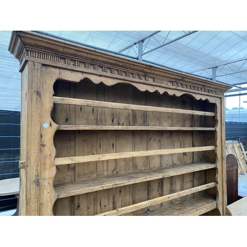 2146 - A LARGE VICTORIAN STYLE PINE DRESSER WITH OPEN BASE, THREE DRAWERS AND UPPER PLATE RACK