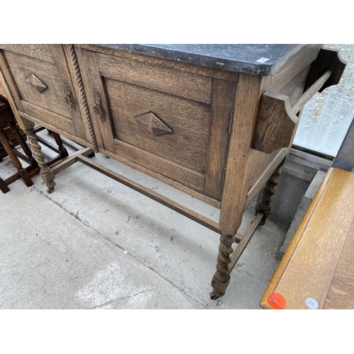 1809 - AN EARLY 20TH CENTURY OAK MARBLE TOP WASH STAND WITH TILED BACK, ON BARLEYTWIST LEGS, 42