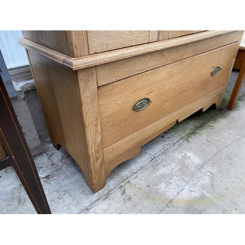 1812 - AN EARLY 20TH CENTURY LIGHT OAK MIRROR-DOOR WARDROBE WITH DRAWER TO BASE, 47