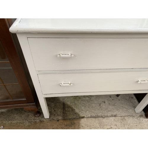 1817 - A WHITE PAINTED CHEST OF TWO DRAWERS ON OAK DRESSING CHEST