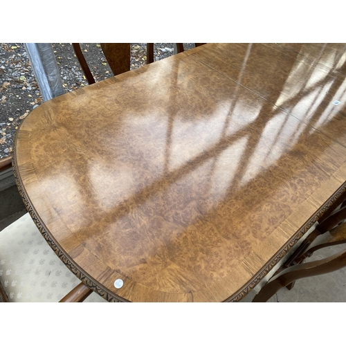 1822 - A MID 20TH CENTURY BURR WALNUT EXTENDING PEDESTAL DINING TABLE, 89x36