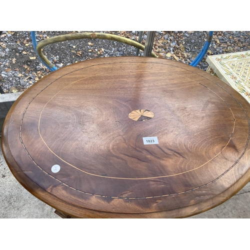 1823 - AN OVAL EDWARDIAN MAHOGANY AND INLAID TWO TIER OCCASIONAL TABLE, ON SPADE FEET, 29