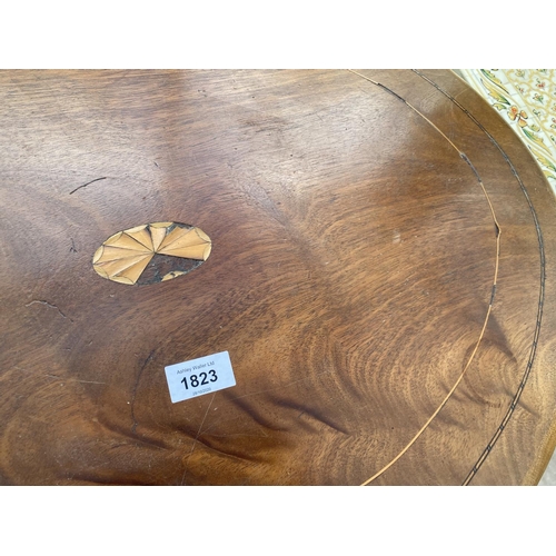 1823 - AN OVAL EDWARDIAN MAHOGANY AND INLAID TWO TIER OCCASIONAL TABLE, ON SPADE FEET, 29