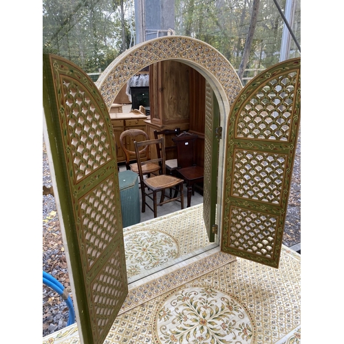 1824 - A MOROCCAN CRESCENT SHAPED DRESSING TABLE WITH SIX DRAWERS, DECORATED WITH CAMEL BONE AND BRASS EFFE... 