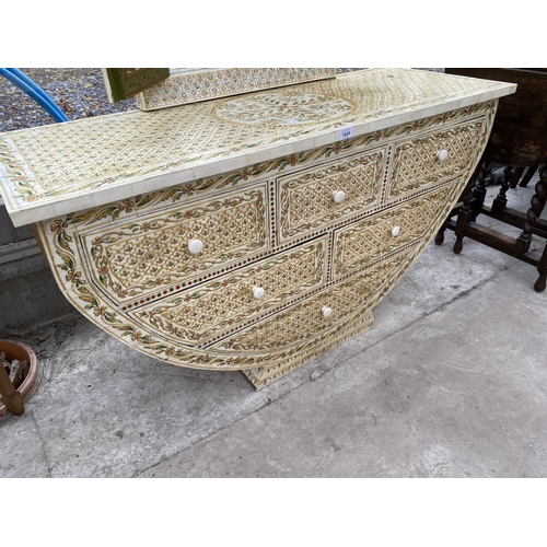 1824 - A MOROCCAN CRESCENT SHAPED DRESSING TABLE WITH SIX DRAWERS, DECORATED WITH CAMEL BONE AND BRASS EFFE... 