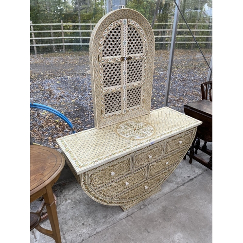 1824 - A MOROCCAN CRESCENT SHAPED DRESSING TABLE WITH SIX DRAWERS, DECORATED WITH CAMEL BONE AND BRASS EFFE... 