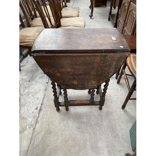 1825 - AN EARLY 20TH CENTURY OAK BARLEYTWIST GATELEG DINING TABLE