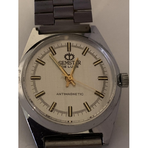 511 - A GEM STAR DE LUX WRIST WATCH IN WORKING ORDER